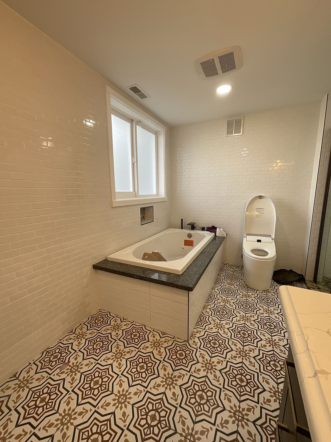 Finished kitchen or bathroom by Legacy Construction Group