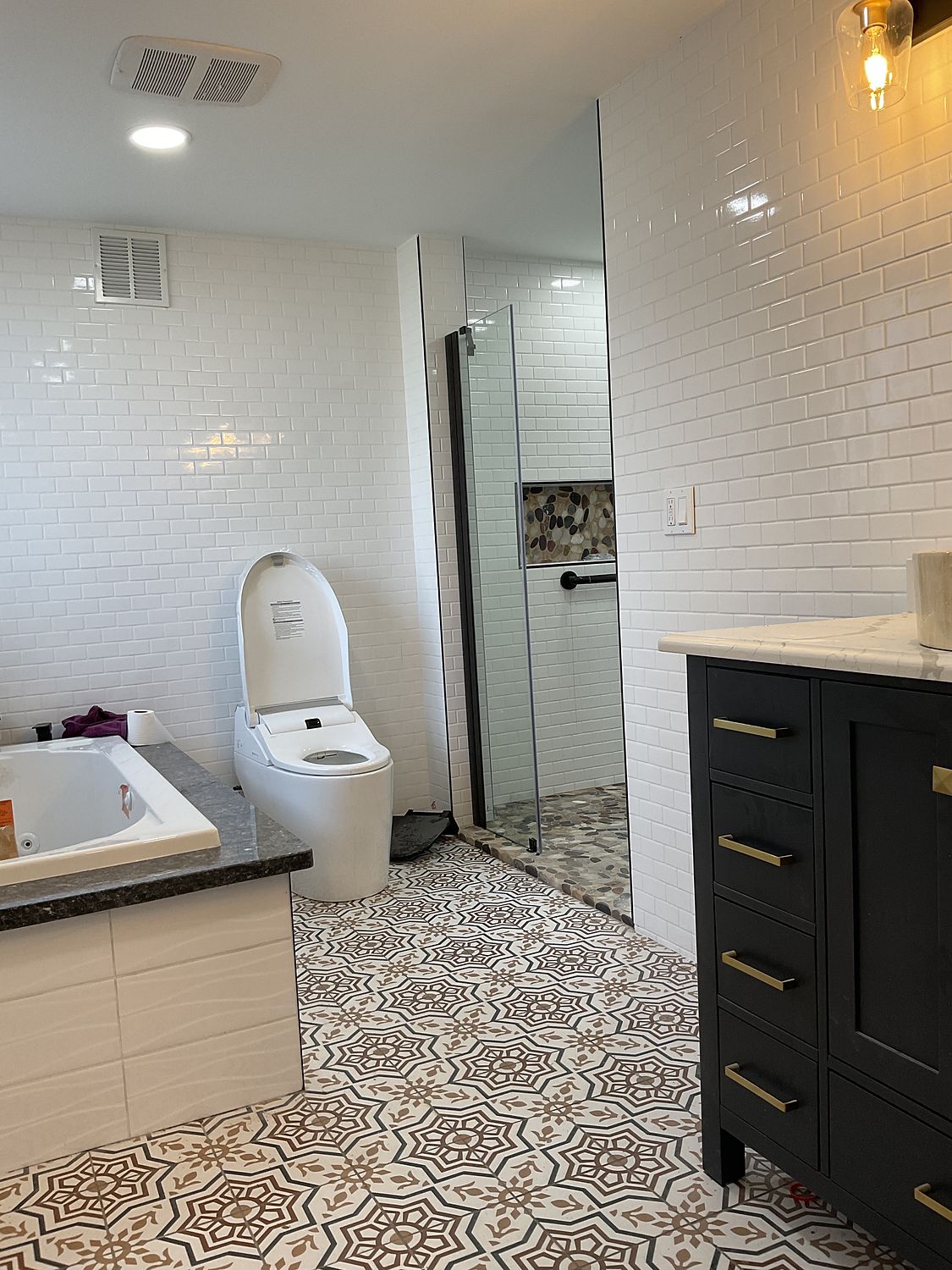 Finished kitchen or bathroom by Legacy Construction Group